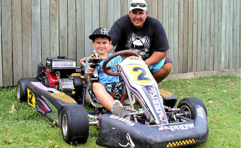 Go-karting rookie of the year Billy Bruce with his race car driver dad, Paul who helped him build his vehicle. Go-karting rookie of the year Billy Bruce with his race car driver dad, Paul who helped him build his vehicle.